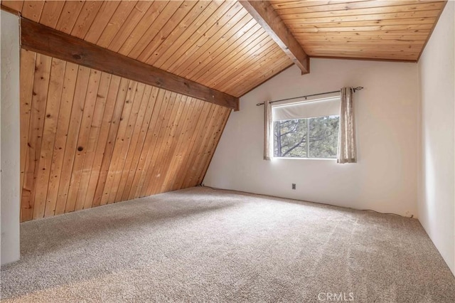 bonus room with vaulted ceiling with beams, carpet flooring, and wood ceiling
