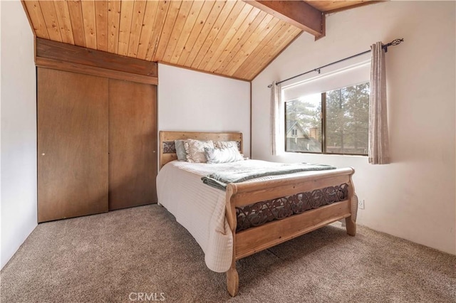 bedroom with wooden ceiling, vaulted ceiling with beams, and carpet flooring
