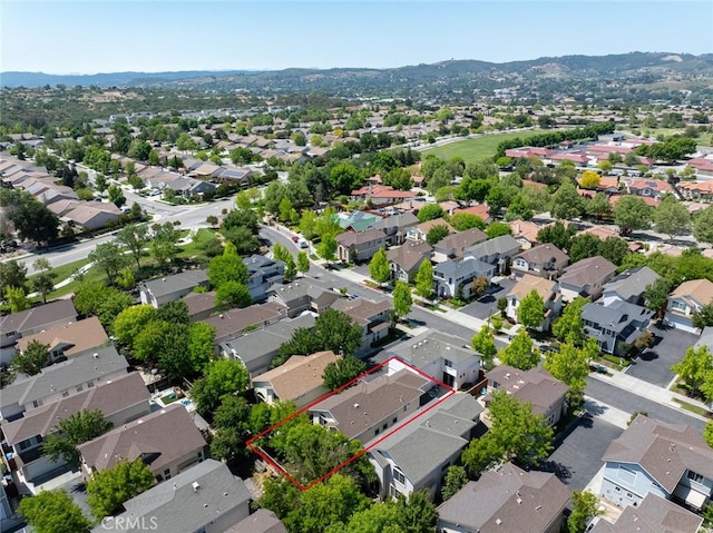 bird's eye view featuring a residential view and a mountain view