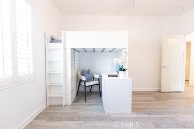 2630 Luminous Ln, Costa Mesa, CA 92626 - interior space featuring light wood-type flooring and baseboards