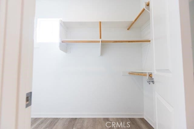 2630 Luminous Ln, Costa Mesa, CA 92626 - walk in closet with wood finished floors