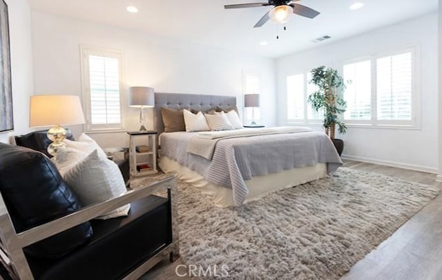 2630 Luminous Ln, Costa Mesa, CA 92626 - bedroom featuring wood finished floors, recessed lighting, baseboards, and ceiling fan