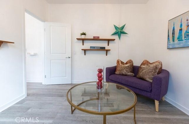2630 Luminous Ln, Costa Mesa, CA 92626 - living area with wood finished floors and baseboards