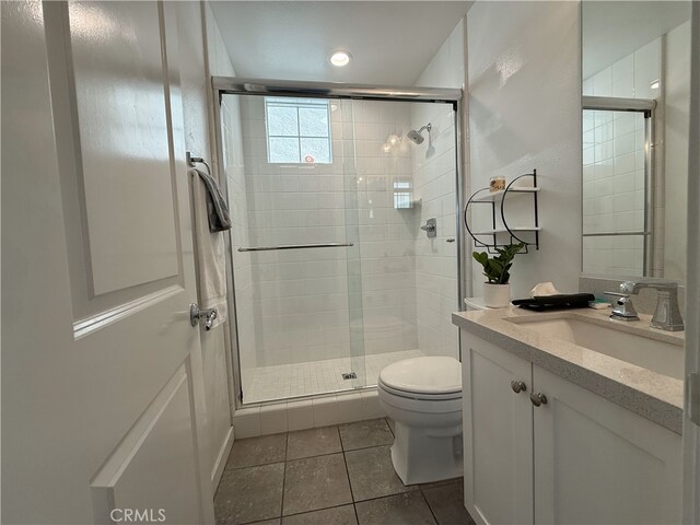 2630 Luminous Ln, Costa Mesa, CA 92626 - full bath featuring tile patterned flooring, a shower stall, toilet, and vanity