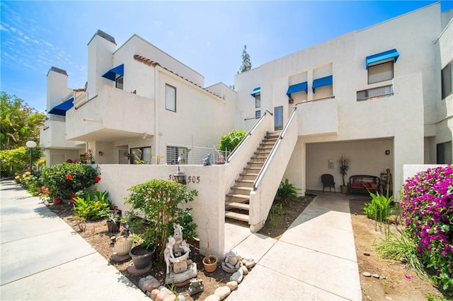 exterior space with stairway and fence