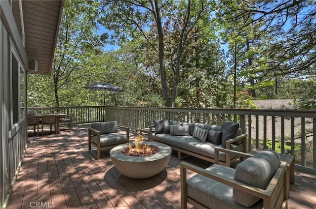 28805 N Shore Rd, Lake Arrowhead, CA 92352 - deck with an outdoor living space with a fire pit