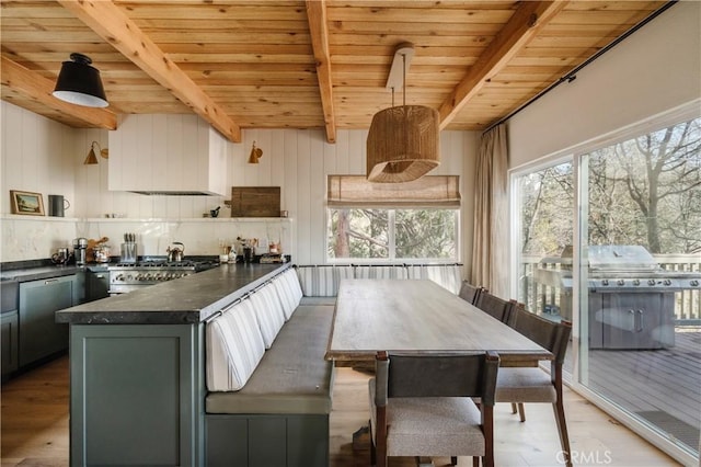 28805 N Shore Rd, Lake Arrowhead, CA 92352 - kitchen featuring dark countertops, wood ceiling, light wood-type flooring, and beam ceiling