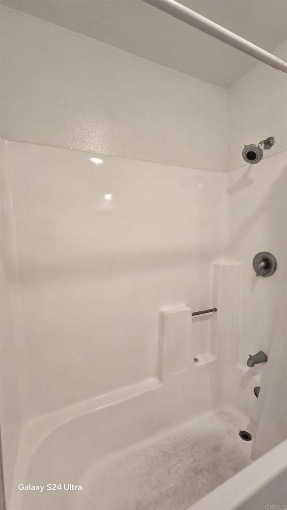 full bath featuring walk in shower