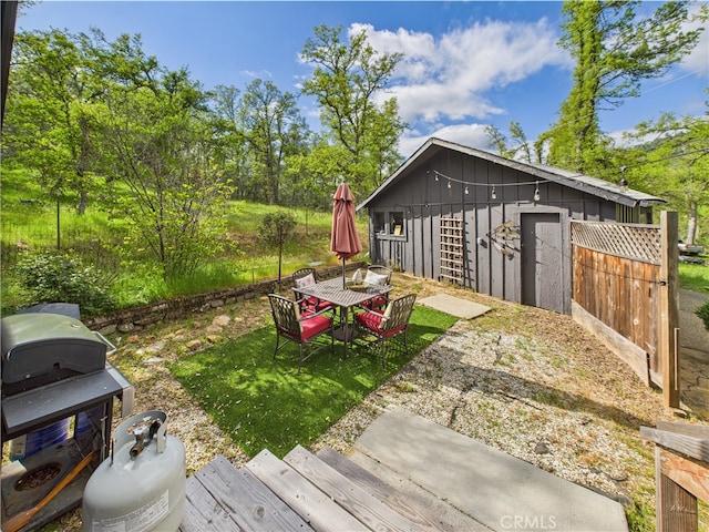 view of yard featuring outdoor dining space