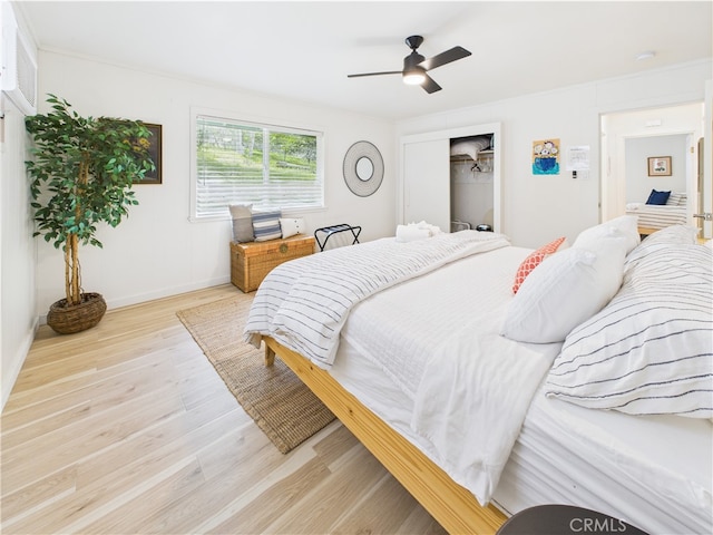 5829 E Whitlock Rd, Mariposa, CA 95338 - bedroom with wood finished floors, a closet, a ceiling fan, baseboards, and ornamental molding