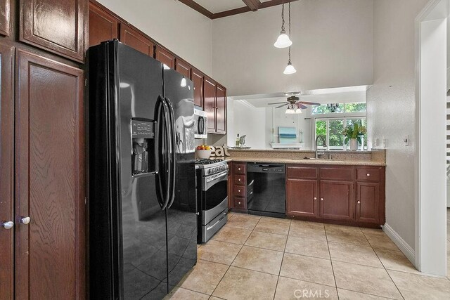 3630 S Bear St Unit 67, Santa Ana, CA 92704 - kitchen featuring black appliances, a sink, light tile patterned flooring, ceiling fan, and a towering ceiling