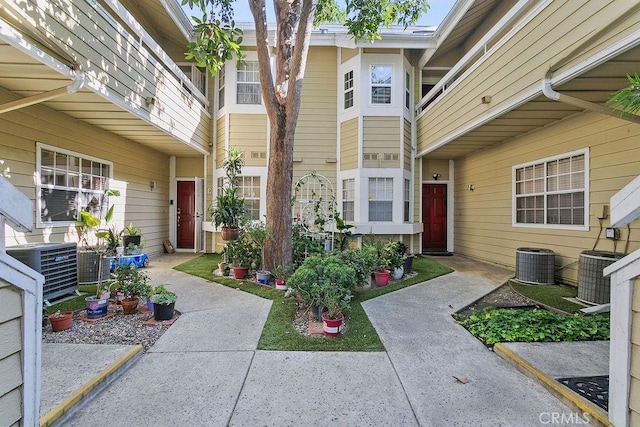 doorway to property featuring central AC