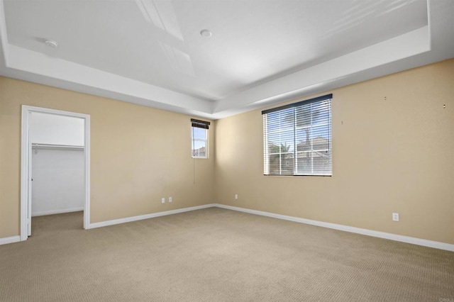 1703 Oconnor Ave, Chula Vista, CA 91913 - unfurnished bedroom featuring a raised ceiling, light colored carpet, a spacious closet, and a closet