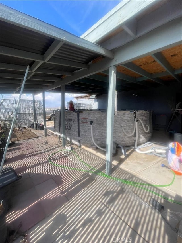 view of patio with fence