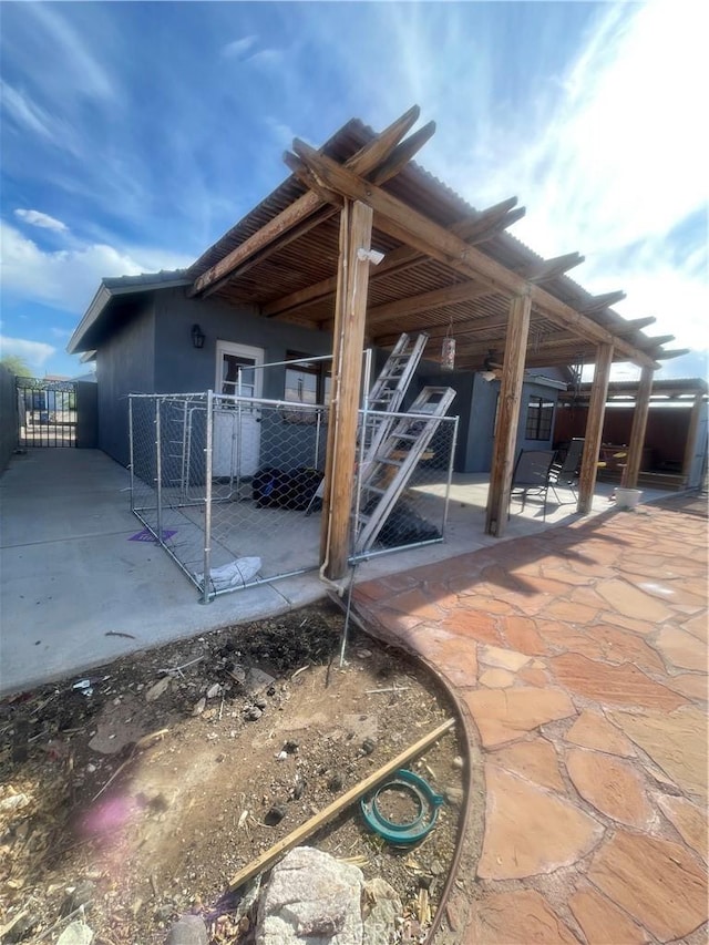 view of patio / terrace with fence