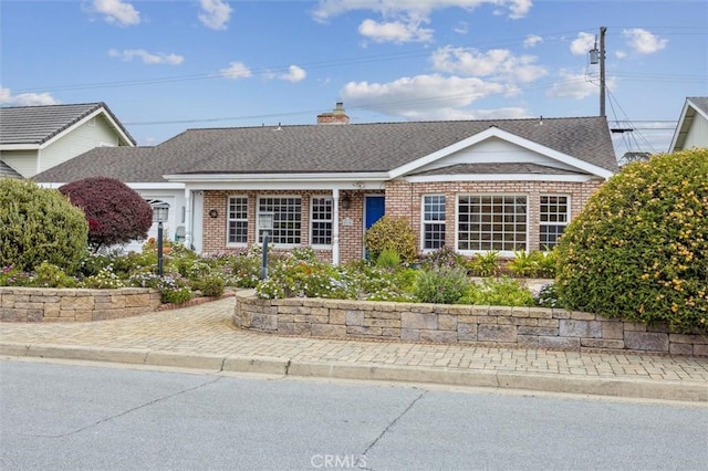 2132 El Dorado St, Los Osos, CA 93402 - single story home featuring brick siding, a chimney, and a shingled roof