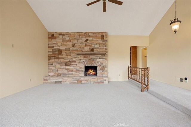 2132 El Dorado St, Los Osos, CA 93402 - unfurnished living room with carpet floors, ceiling fan, vaulted ceiling, and a fireplace