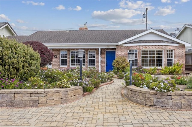 2132 El Dorado St, Los Osos, CA 93402 - ranch-style home featuring roof with shingles, a chimney, and brick siding