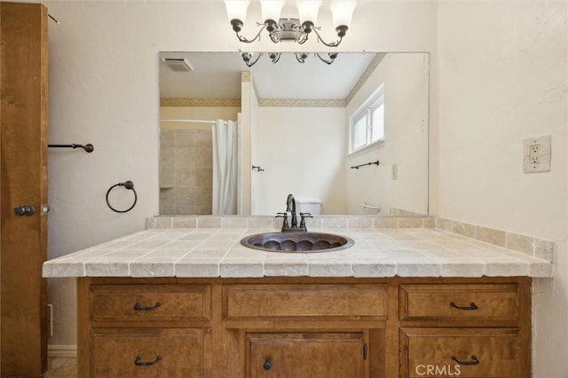 2132 El Dorado St, Los Osos, CA 93402 - bathroom with vanity, curtained shower, a chandelier, and visible vents