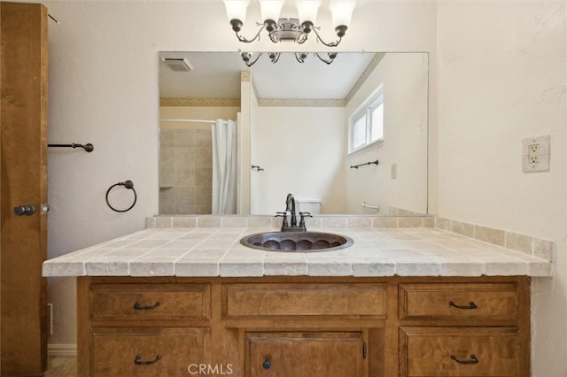 2132 El Dorado St, Los Osos, CA 93402 - full bath featuring vanity, a chandelier, and a shower with shower curtain