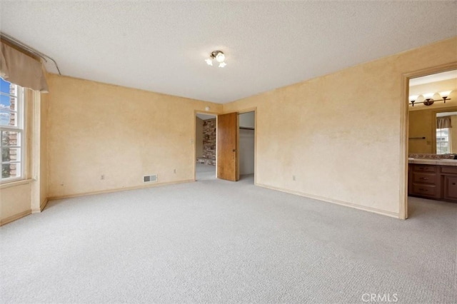 2132 El Dorado St, Los Osos, CA 93402 - unfurnished bedroom with light colored carpet and ensuite bath