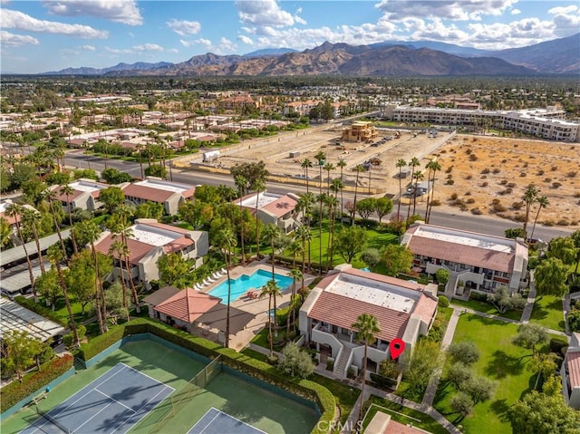 1100 E Amado Rd Unit 11A1, Palm Springs, CA 92262 - aerial view of residential area featuring a mountain backdrop and a pool