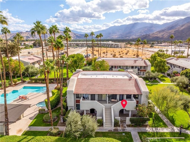 1100 E Amado Rd Unit 11A1, Palm Springs, CA 92262 - view of subject property with mountains and a pool