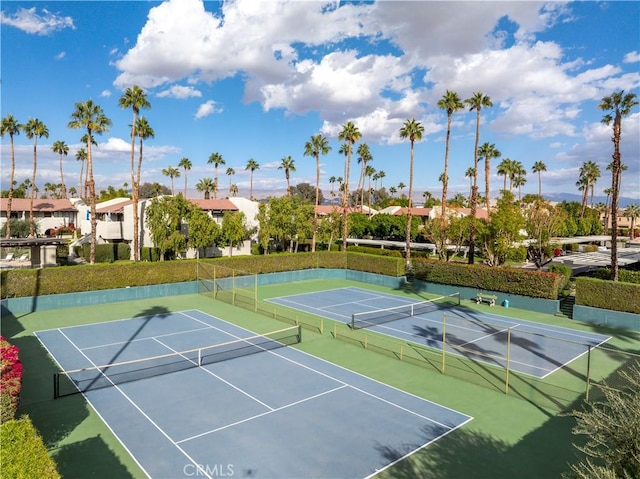 1100 E Amado Rd Unit 11A1, Palm Springs, CA 92262 - view of tennis court featuring fence and community basketball court