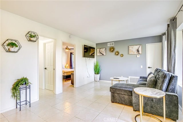 1100 E Amado Rd Unit 11A1, Palm Springs, CA 92262 - living area featuring light tile patterned floors, baseboards, and a ceiling fan