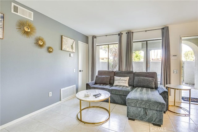 1100 E Amado Rd Unit 11A1, Palm Springs, CA 92262 - living room with light tile patterned floors