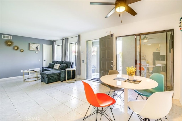 1100 E Amado Rd Unit 11A1, Palm Springs, CA 92262 - dining area featuring ceiling fan and light tile patterned flooring
