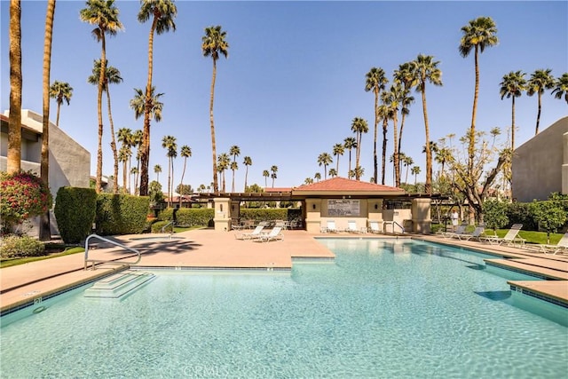 1100 E Amado Rd Unit 11A1, Palm Springs, CA 92262 - community pool with a patio