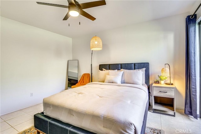 1100 E Amado Rd Unit 11A1, Palm Springs, CA 92262 - bedroom with light tile patterned floors and a ceiling fan