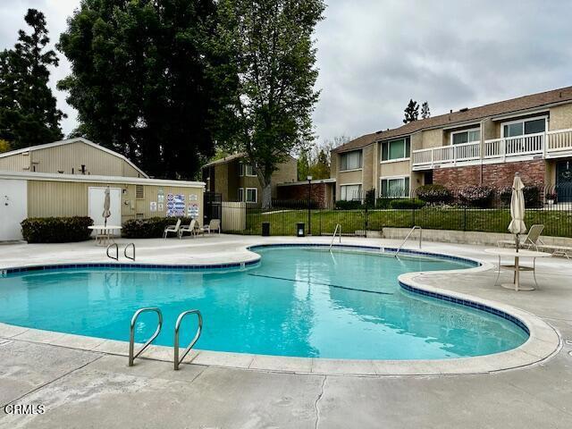 15091 Varsity St Unit C, Moorpark, CA 93021 - community pool featuring a patio area and fence