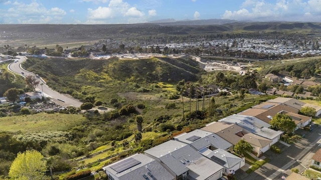 bird's eye view with a residential view and a mountain view