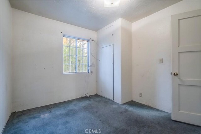 10180 Eddystone St, Riverside, CA 92503 - unfurnished bedroom featuring carpet floors and a closet