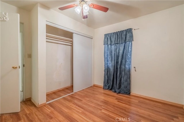 10180 Eddystone St, Riverside, CA 92503 - unfurnished bedroom with ceiling fan, a closet, and light wood-style flooring