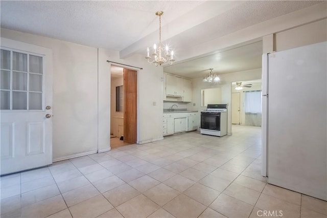 10180 Eddystone St, Riverside, CA 92503 - kitchen featuring a sink, light tile patterned floors, ceiling fan with notable chandelier, and white appliances