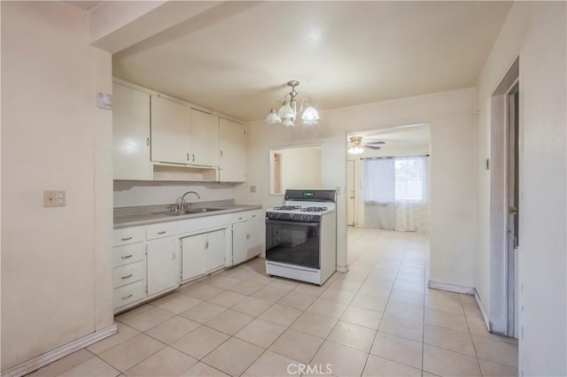 10180 Eddystone St, Riverside, CA 92503 - kitchen with a sink, light countertops, a chandelier, white cabinetry, and gas range oven