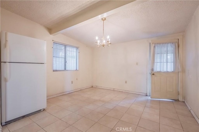 10180 Eddystone St, Riverside, CA 92503 - unfurnished dining area featuring light tile patterned flooring, a textured ceiling, a notable chandelier, and a healthy amount of sunlight