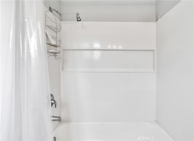 full bath with shower / bathtub combination with curtain