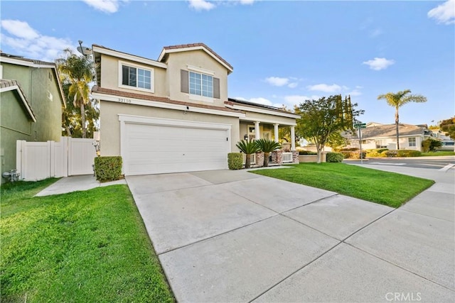 32110 Camino Herencia, Temecula, CA 92592 - traditional-style house featuring stucco siding, an attached garage, and driveway