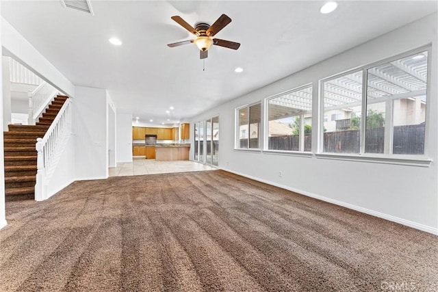 unfurnished living room featuring recessed lighting, visible vents, and light colored carpet