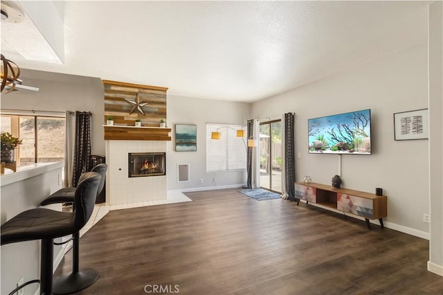 41787 Humber Dr, Temecula, CA 92591 - living room with baseboards, a fireplace, and wood finished floors