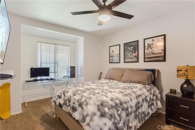 41787 Humber Dr, Temecula, CA 92591 - bedroom with dark colored carpet, baseboards, and a ceiling fan
