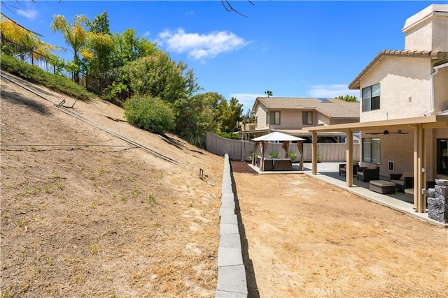 41787 Humber Dr, Temecula, CA 92591 - view of yard with outdoor lounge area, a patio, fence, and a gazebo