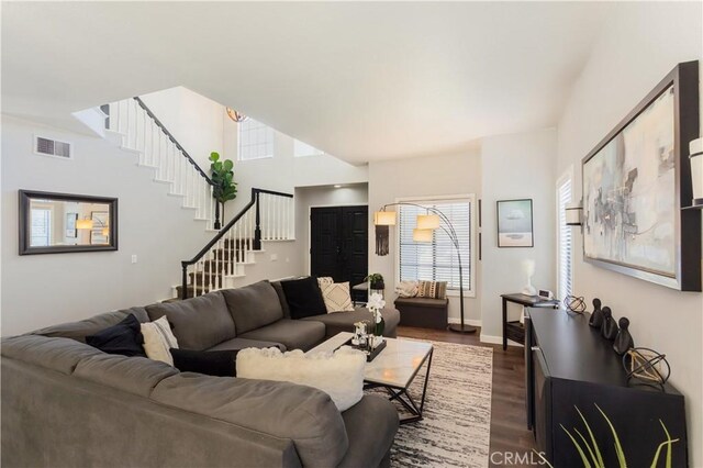 41787 Humber Dr, Temecula, CA 92591 - living area with stairway, dark wood finished floors, and baseboards
