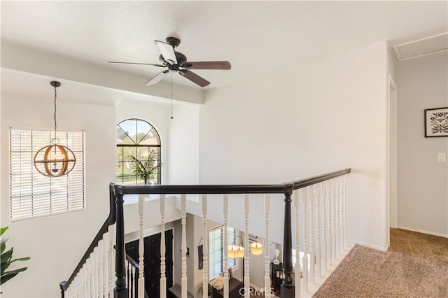 41787 Humber Dr, Temecula, CA 92591 - hallway with an upstairs landing, carpet floors, and baseboards