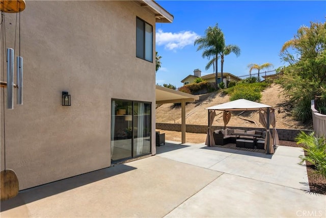 41787 Humber Dr, Temecula, CA 92591 - view of patio featuring outdoor lounge area, a gazebo, and fence