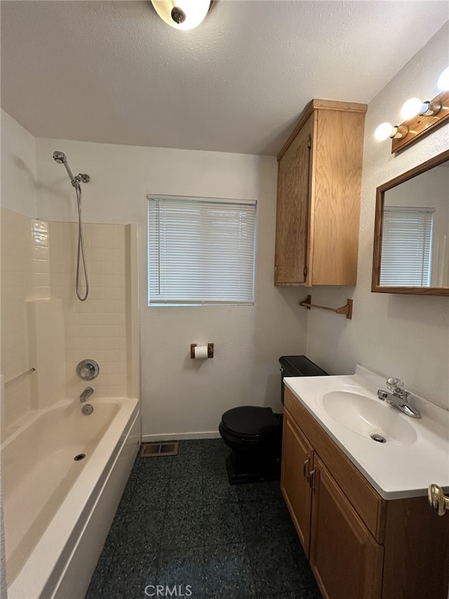 full bath with vanity, toilet, baseboards, shower / bath combination, and visible vents